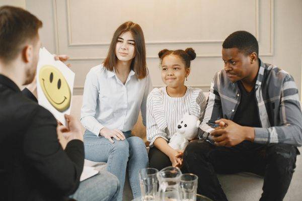 Photo of a family doing a therapy session